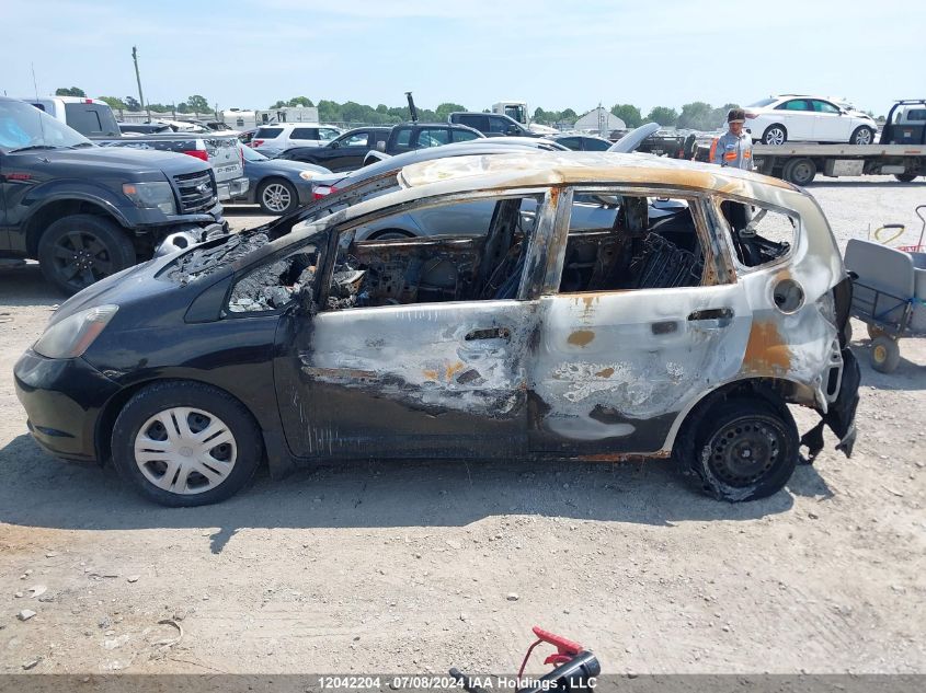 2009 Honda Fit VIN: JHMGE87359S804650 Lot: 12042204