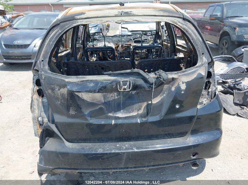 2009 Honda Fit VIN: JHMGE87359S804650 Lot: 12042204