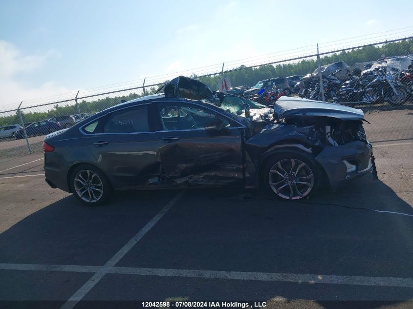 2019 Ford Fusion Hybrid Titanium VIN: 3FA6P0RUXKR190961 Lot: 12042598