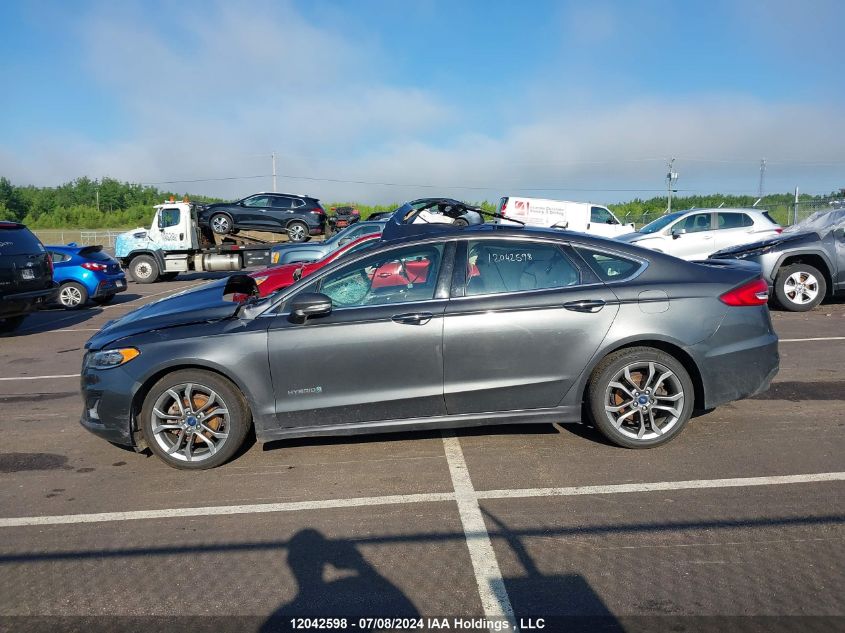 2019 Ford Fusion Hybrid Titanium VIN: 3FA6P0RUXKR190961 Lot: 12042598