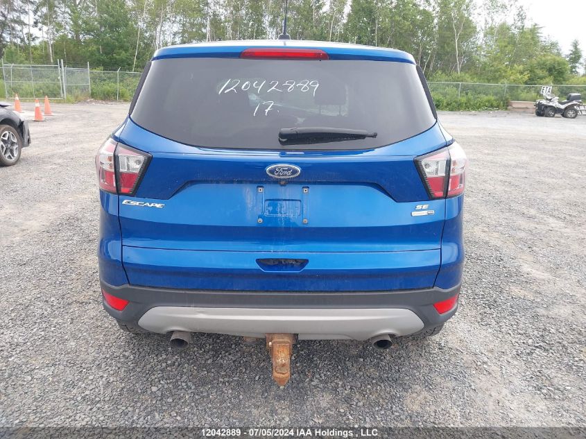 2017 Ford Escape Se VIN: 1FMCU9G9XHUE59787 Lot: 12042889