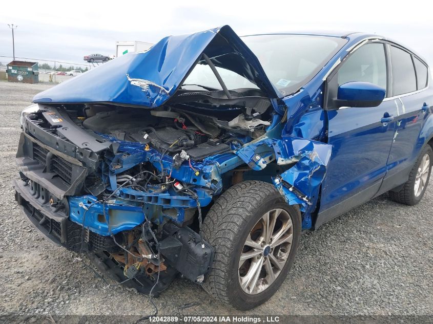 2017 Ford Escape Se VIN: 1FMCU9G9XHUE59787 Lot: 12042889