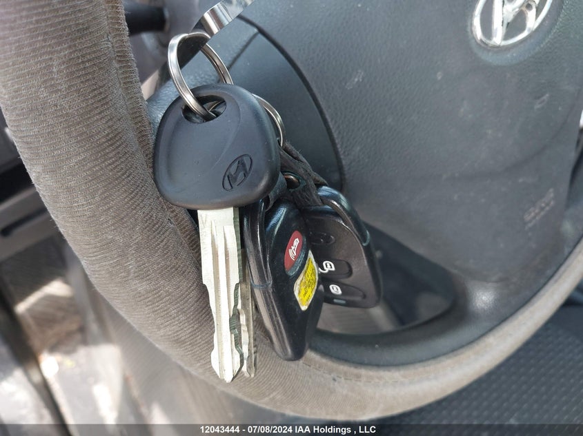 2007 Hyundai Accent VIN: KMHCN35C27U054370 Lot: 12043444