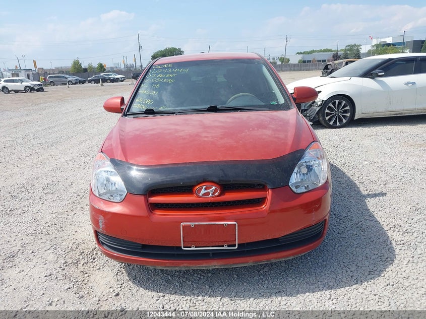 2007 Hyundai Accent VIN: KMHCN35C27U054370 Lot: 12043444