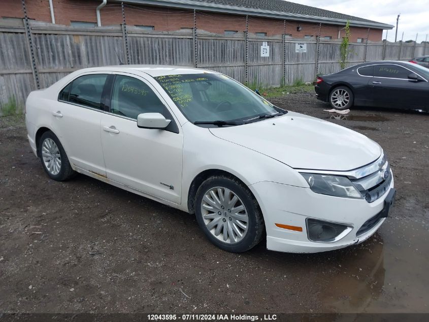 2010 Ford Fusion Hybrid VIN: 3FADP0L34AR289121 Lot: 12043595