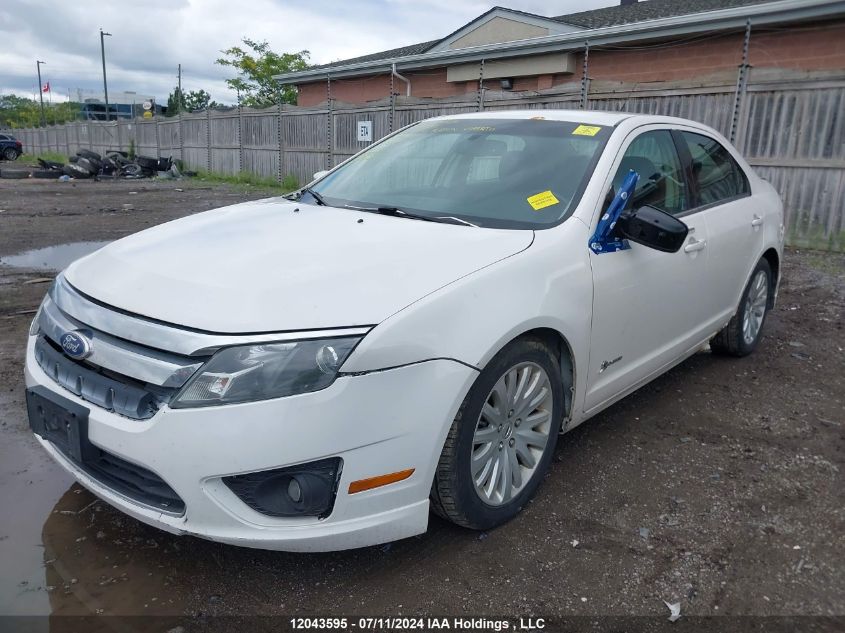 2010 Ford Fusion Hybrid VIN: 3FADP0L34AR289121 Lot: 12043595