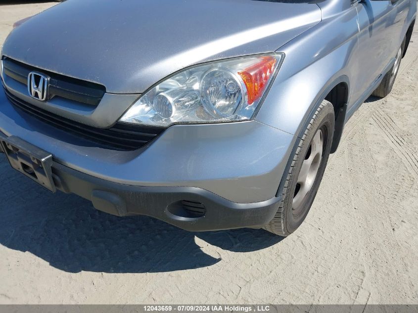 2007 Honda Cr-V Lx VIN: 5J6RE38337L800464 Lot: 12043659