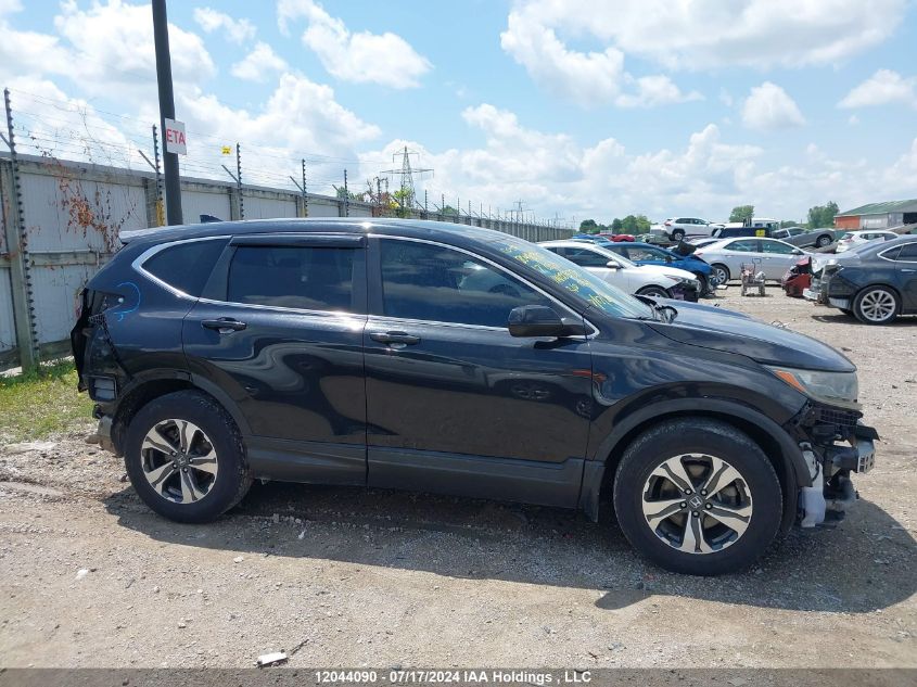 2017 Honda Cr-V VIN: 2HKRW1H3XHH003870 Lot: 12044090