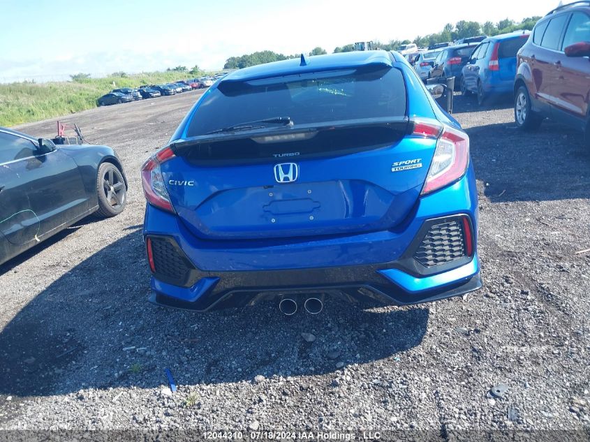 2018 Honda Civic Hatchback VIN: SHHFK7H99JU301674 Lot: 12044310