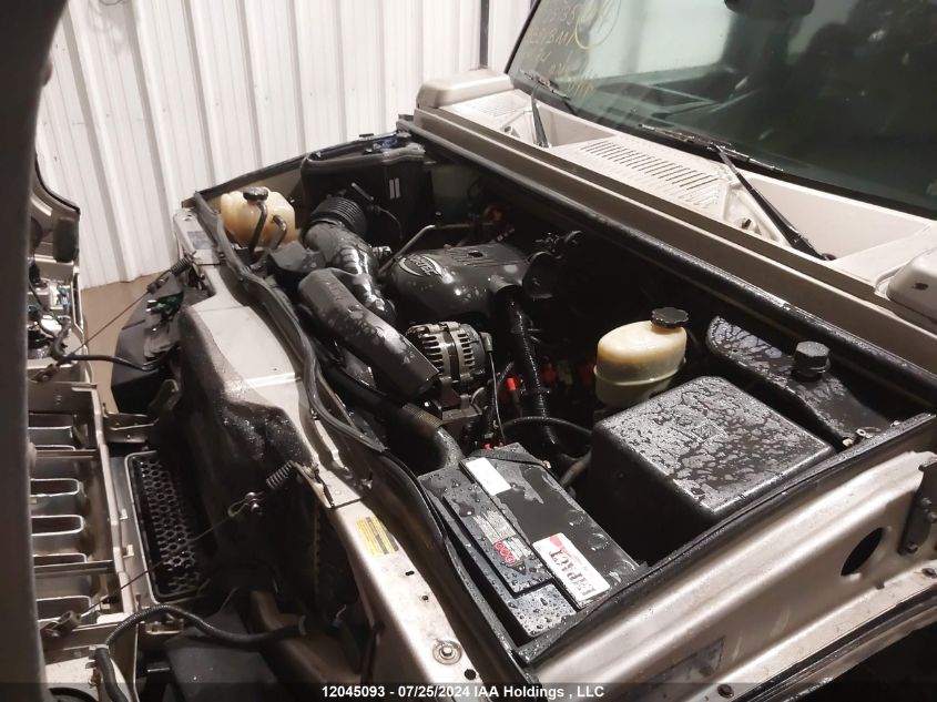 2003 Hummer H2 VIN: 5GRGN23U13H125135 Lot: 12045093