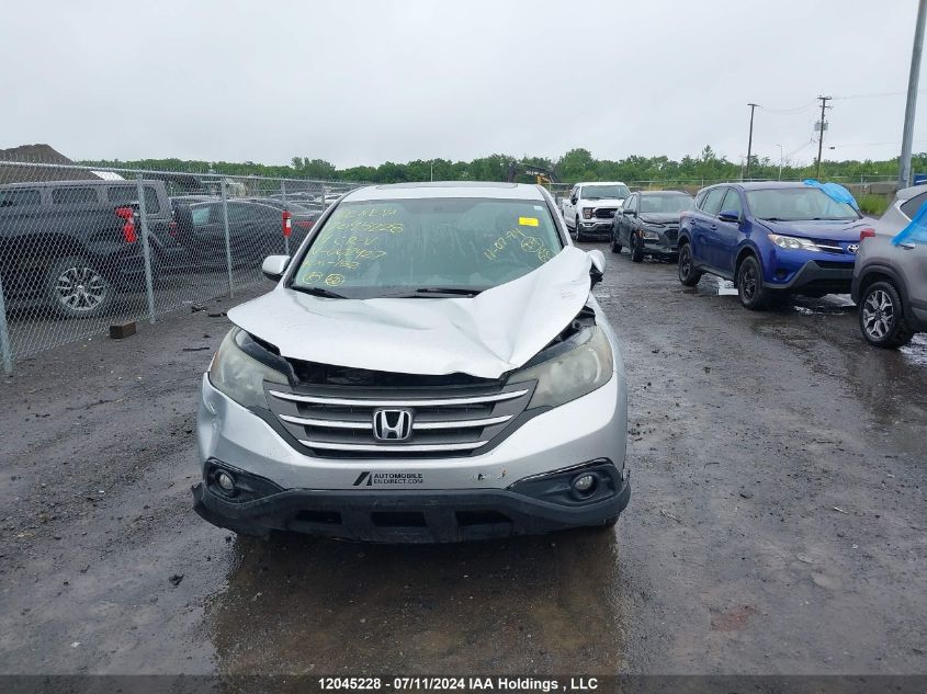 2014 Honda Cr-V VIN: 2HKRM3H51EH002427 Lot: 12045228