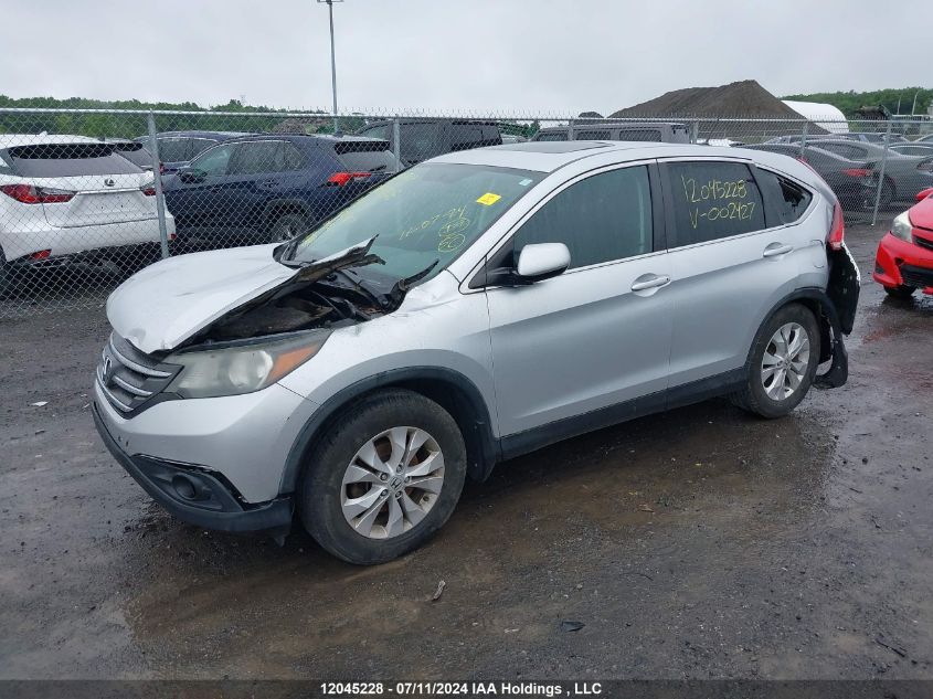 2014 Honda Cr-V VIN: 2HKRM3H51EH002427 Lot: 12045228