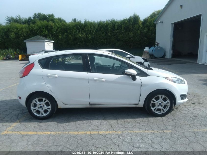 2015 Ford Fiesta VIN: 3FADP4EJ8FM124552 Lot: 12045383