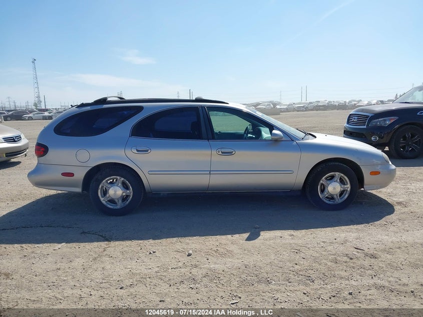 1999 Ford Taurus Se VIN: 1FAFP58UXXG156273 Lot: 12045619