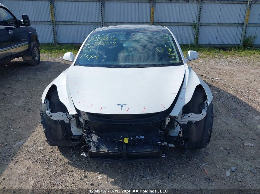 2019 Tesla Model 3 VIN: 5YJ3E1EB6KF393909 Lot: 12045797