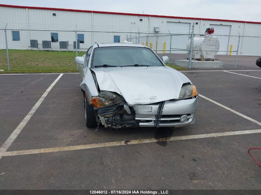 2003 Hyundai Tiburon VIN: KMHHN65D93U022929 Lot: 12046012