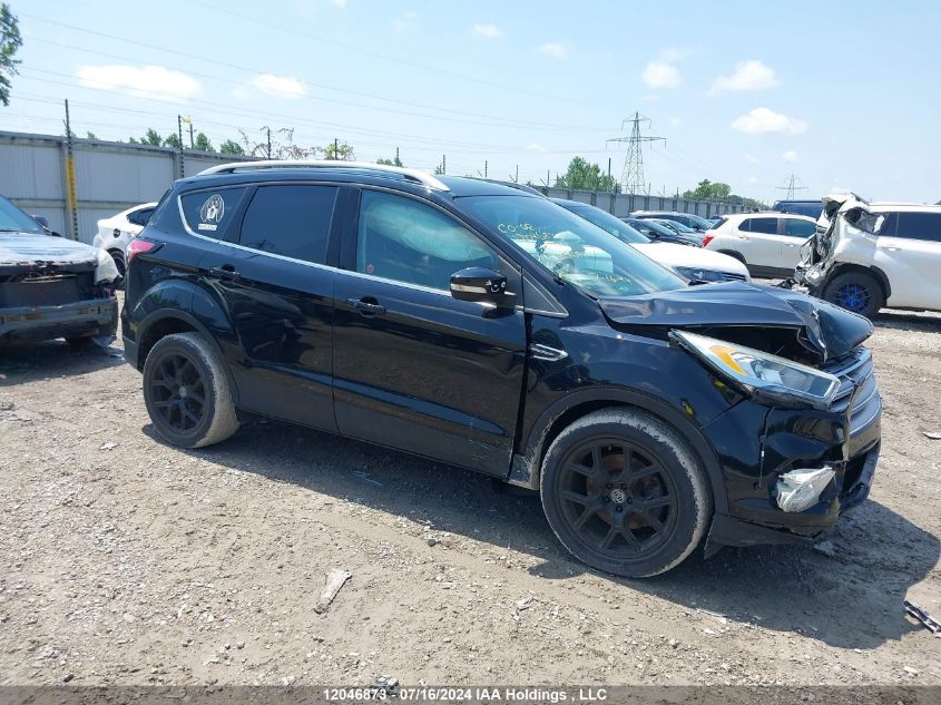 2017 Ford Escape Titanium VIN: 1FMCU0J99HUA01694 Lot: 12046873