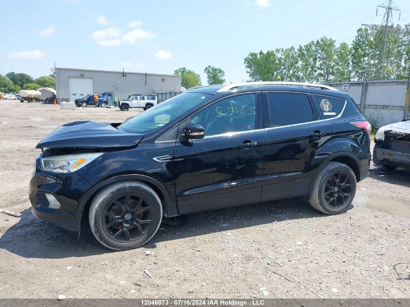 2017 Ford Escape Titanium VIN: 1FMCU0J99HUA01694 Lot: 12046873