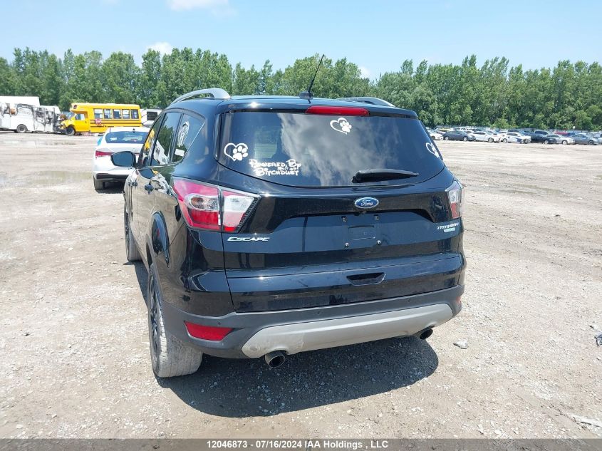 2017 Ford Escape Titanium VIN: 1FMCU0J99HUA01694 Lot: 12046873