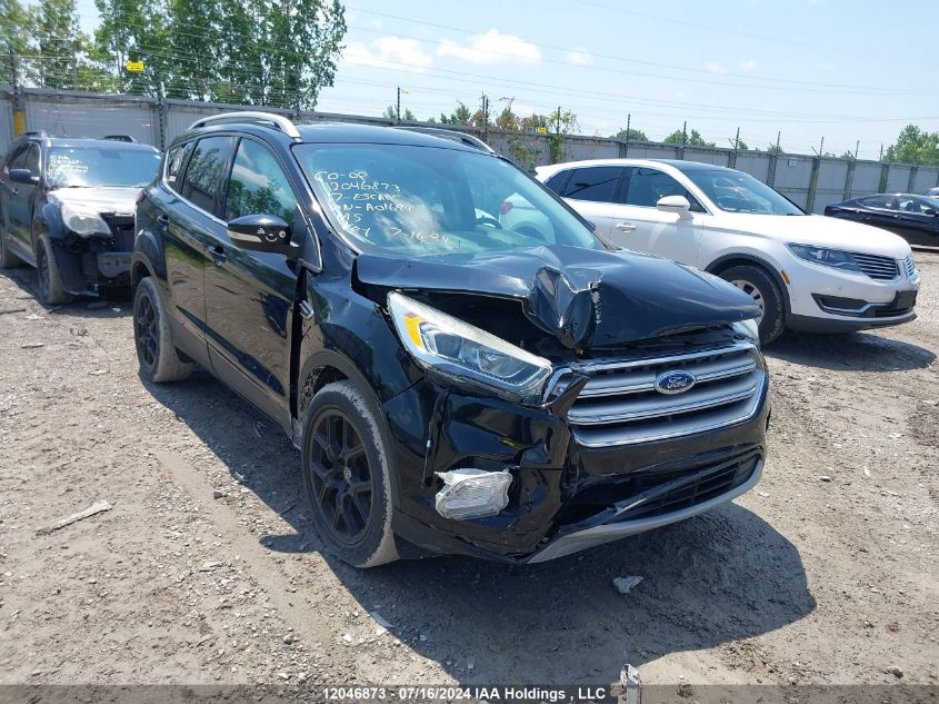 2017 Ford Escape Titanium VIN: 1FMCU0J99HUA01694 Lot: 12046873