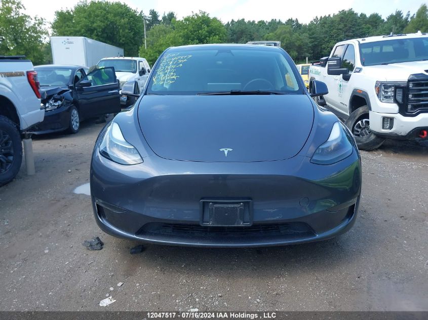 2022 Tesla Model Y VIN: 7SAYGAEE0NF519134 Lot: 12047517