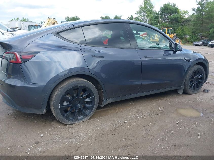 2022 Tesla Model Y VIN: 7SAYGAEE0NF519134 Lot: 12047517