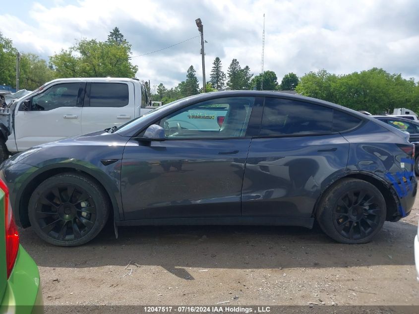 2022 Tesla Model Y VIN: 7SAYGAEE0NF519134 Lot: 12047517