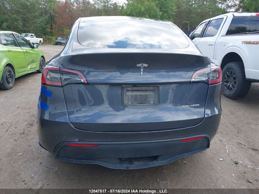 2022 Tesla Model Y VIN: 7SAYGAEE0NF519134 Lot: 12047517