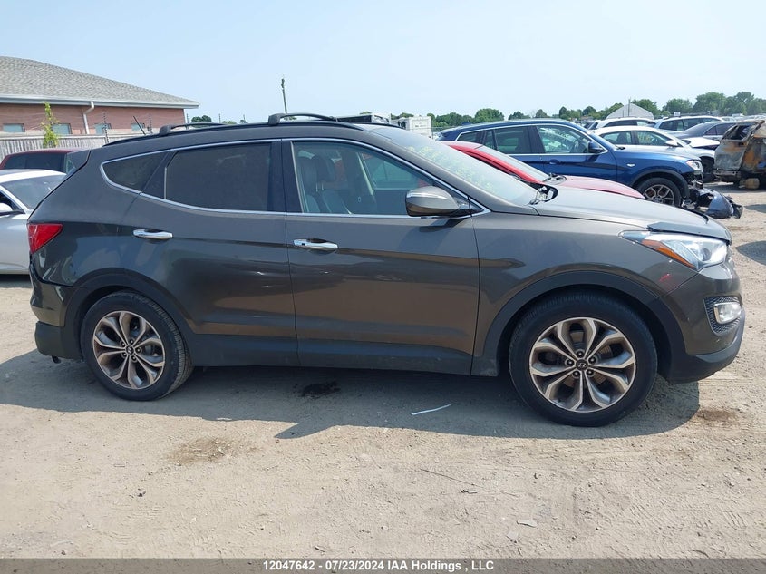 2014 Hyundai Santa Fe Sport VIN: 5XYZUDLA5EG201823 Lot: 12047642
