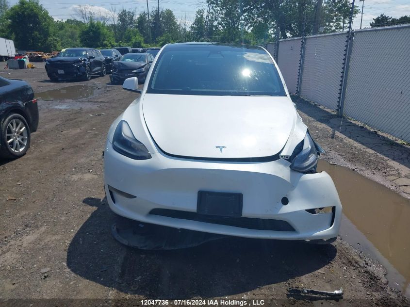 2022 Tesla Model Y VIN: 7SAYGAEE4NF532615 Lot: 12047736