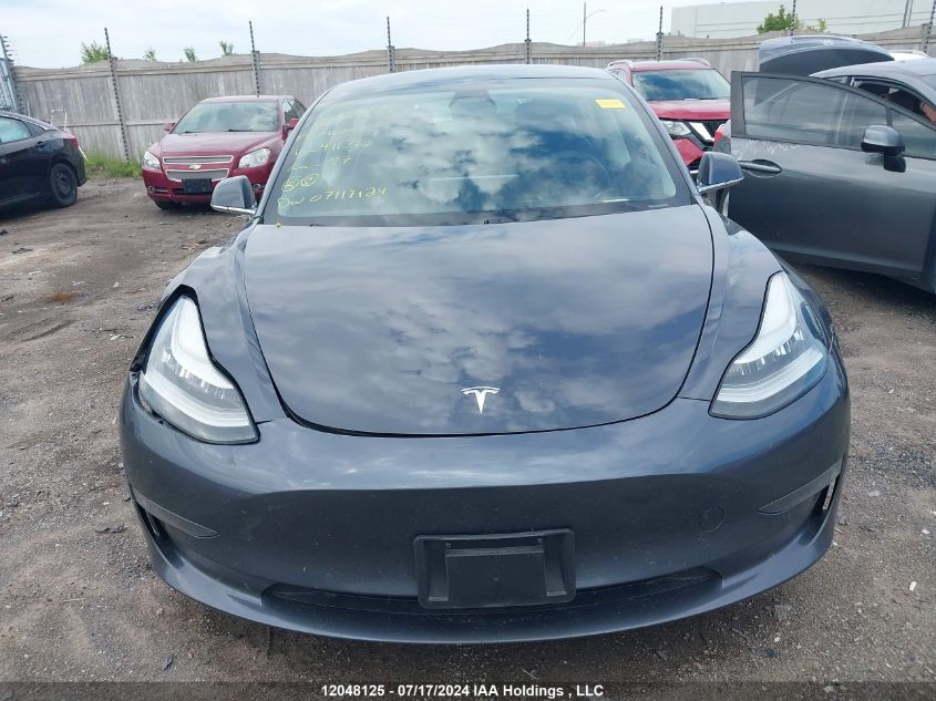 2019 Tesla Model 3 VIN: 5YJ3E1EA0KF411313 Lot: 12048125