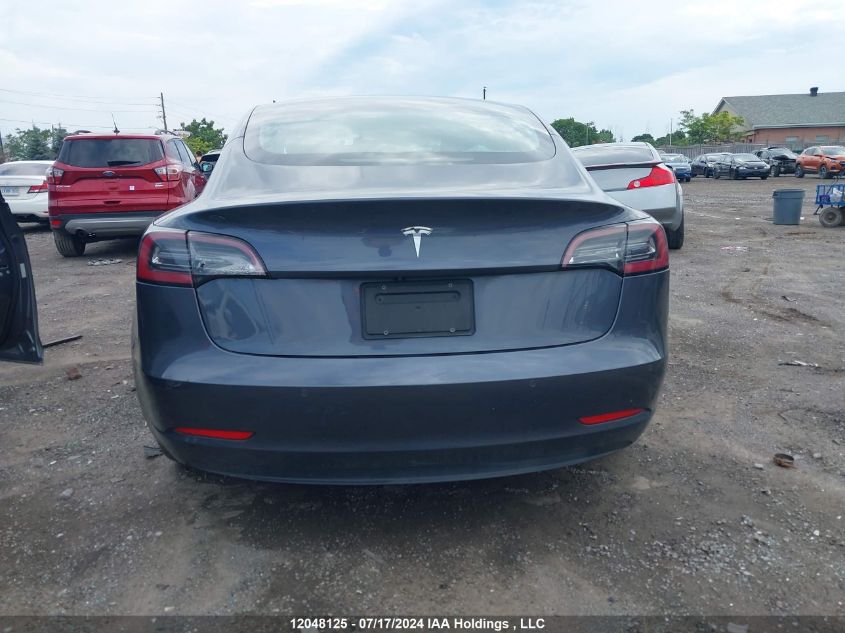 2019 Tesla Model 3 VIN: 5YJ3E1EA0KF411313 Lot: 12048125