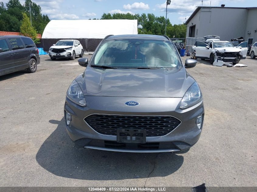 2021 Ford Escape VIN: 1FMCU9H67MUA41184 Lot: 12048409