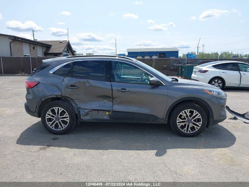 2021 Ford Escape VIN: 1FMCU9H67MUA41184 Lot: 12048409