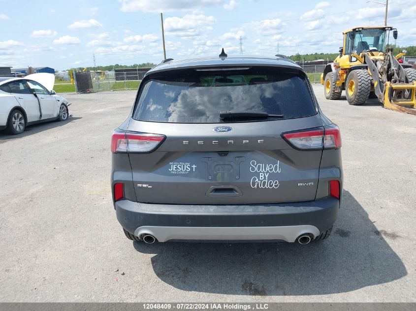 2021 Ford Escape VIN: 1FMCU9H67MUA41184 Lot: 12048409