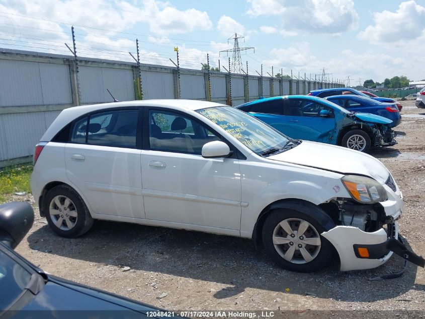 2011 Kia Rio VIN: KNADH5B34B6830573 Lot: 12048421