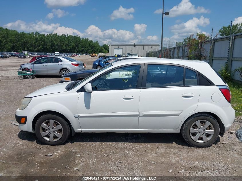 2011 Kia Rio VIN: KNADH5B34B6830573 Lot: 12048421