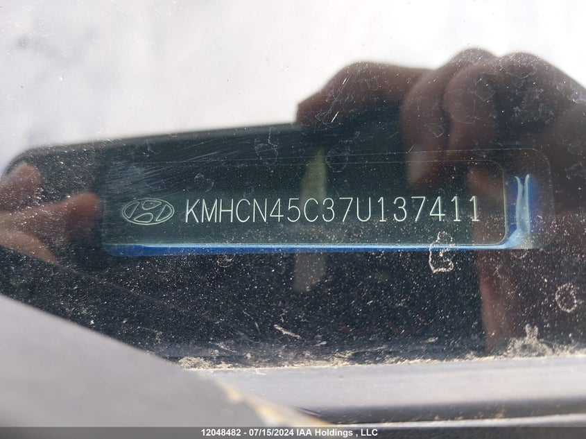 2007 Hyundai Accent VIN: KMHCN45C37U137411 Lot: 12048482