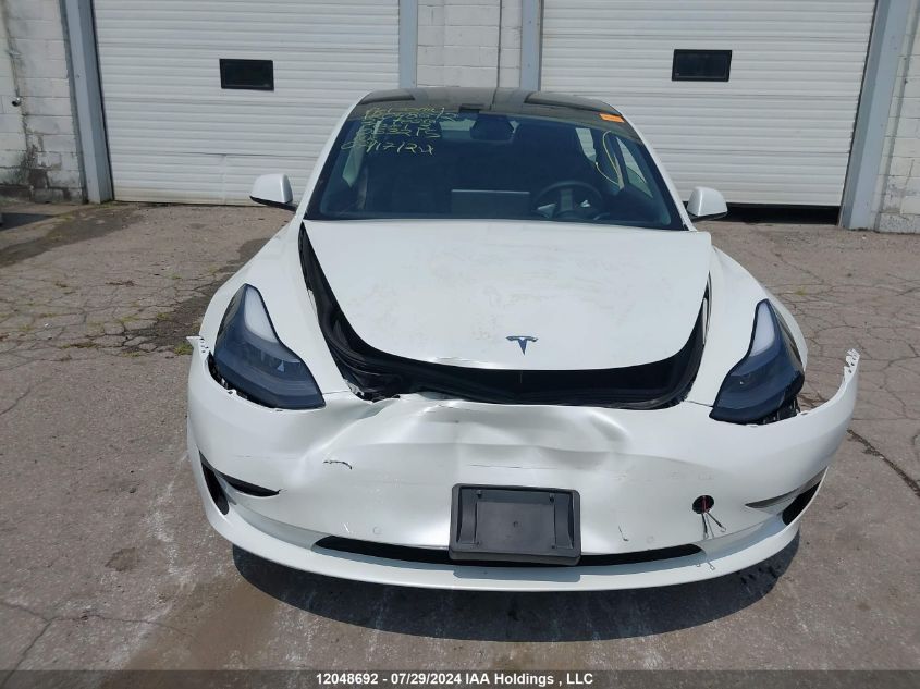 2021 Tesla Model 3 VIN: 5YJ3E1EA2MF053215 Lot: 12048692