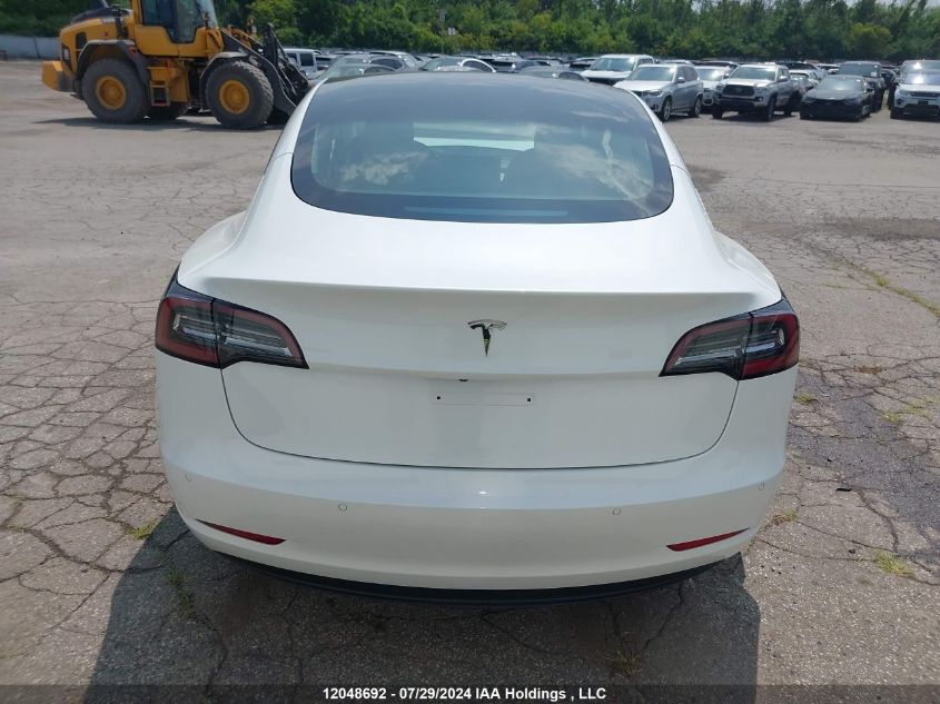 2021 Tesla Model 3 VIN: 5YJ3E1EA2MF053215 Lot: 12048692