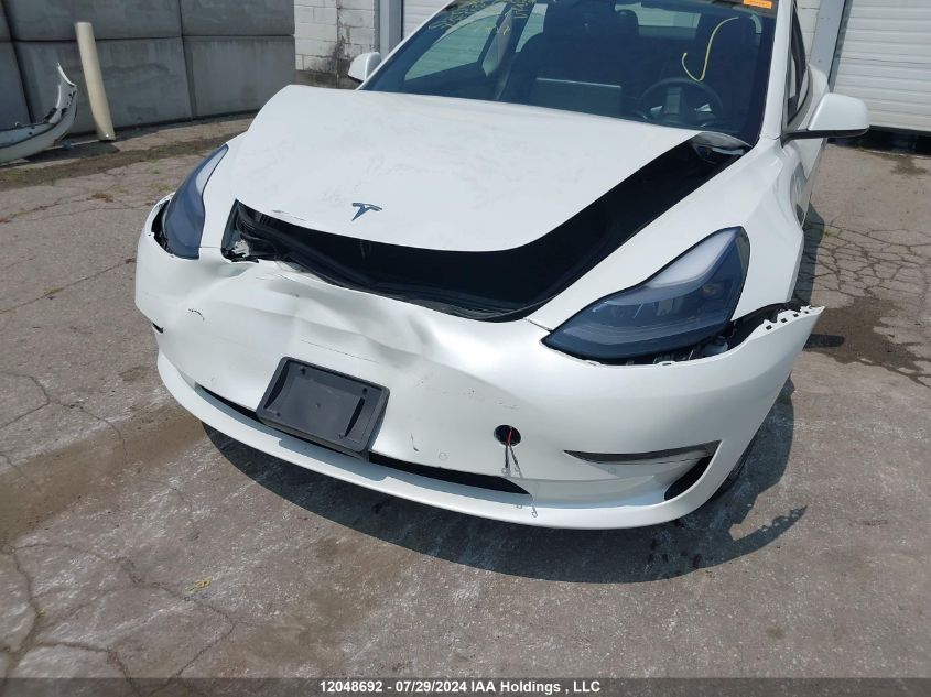 2021 Tesla Model 3 VIN: 5YJ3E1EA2MF053215 Lot: 12048692