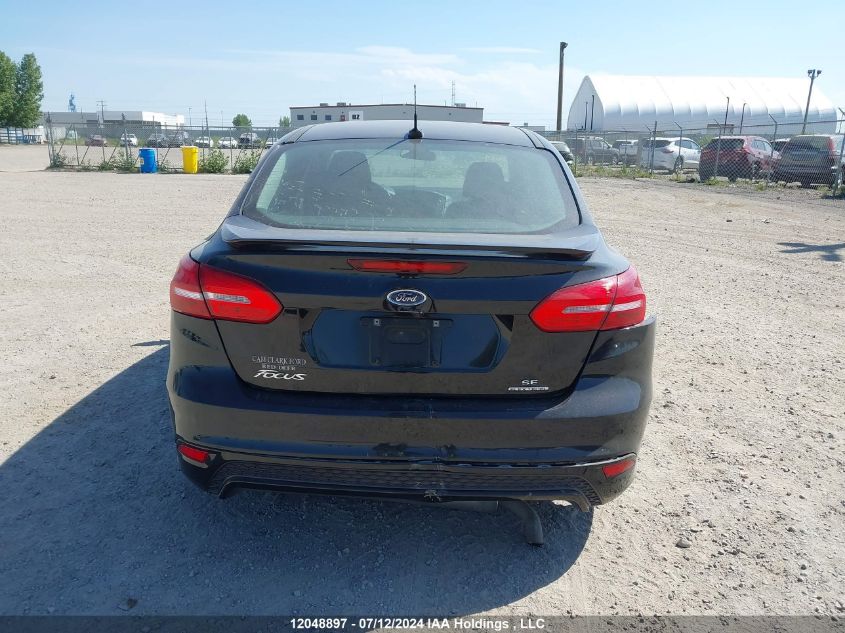 2015 Ford Focus Se VIN: 1FADP3F20FL362012 Lot: 12048897