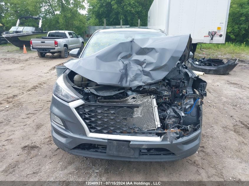 2019 Hyundai Tucson Essential W/Safety Package VIN: KM8J2CA47KU852323 Lot: 12048931