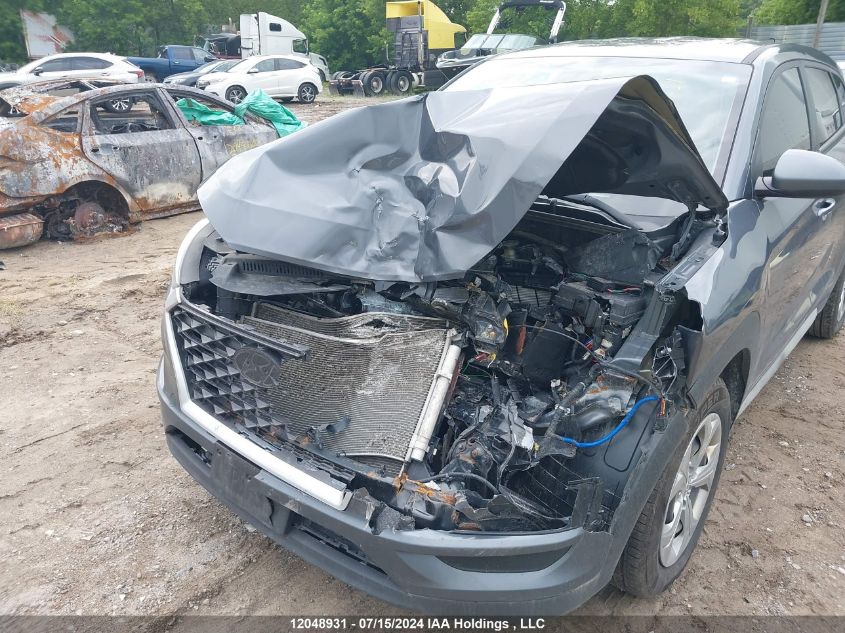 2019 Hyundai Tucson Essential W/Safety Package VIN: KM8J2CA47KU852323 Lot: 12048931