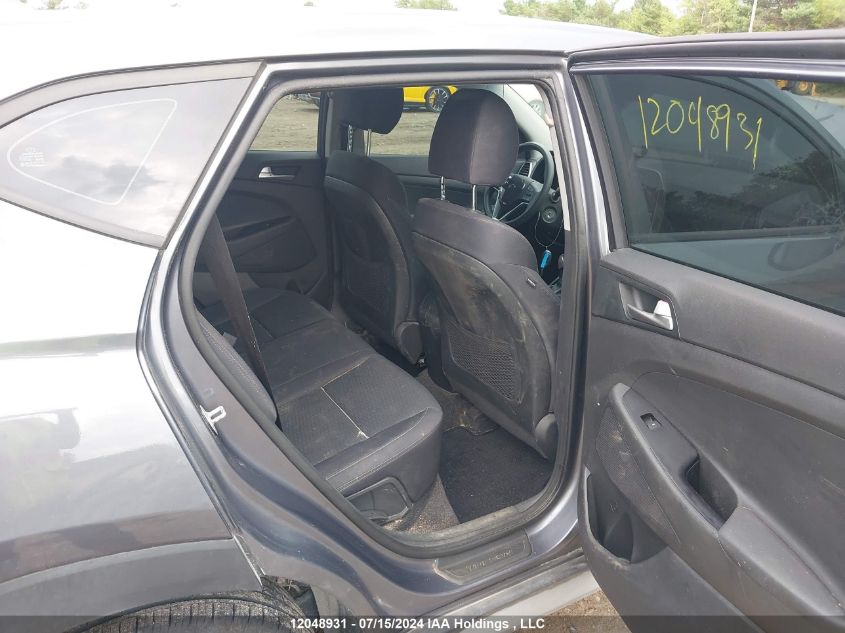 2019 Hyundai Tucson Essential W/Safety Package VIN: KM8J2CA47KU852323 Lot: 12048931