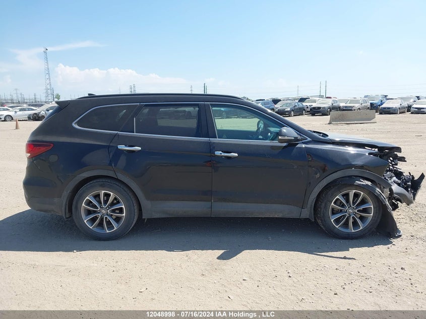 2017 Hyundai Santa Fe Se/Limited VIN: KM8SNDHF1HU210973 Lot: 12048998