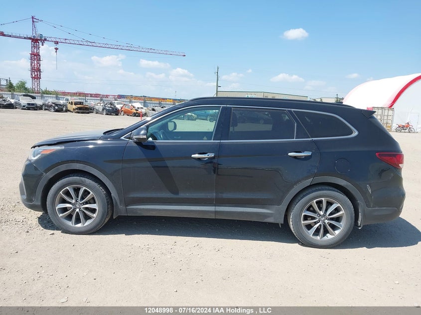 2017 Hyundai Santa Fe Se/Limited VIN: KM8SNDHF1HU210973 Lot: 12048998