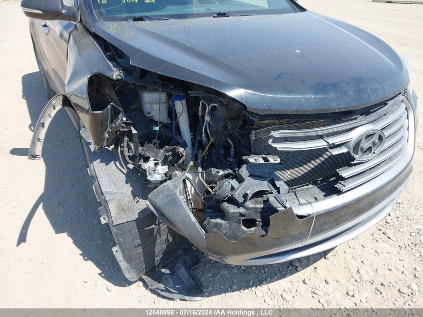 2017 Hyundai Santa Fe Se/Limited VIN: KM8SNDHF1HU210973 Lot: 12048998