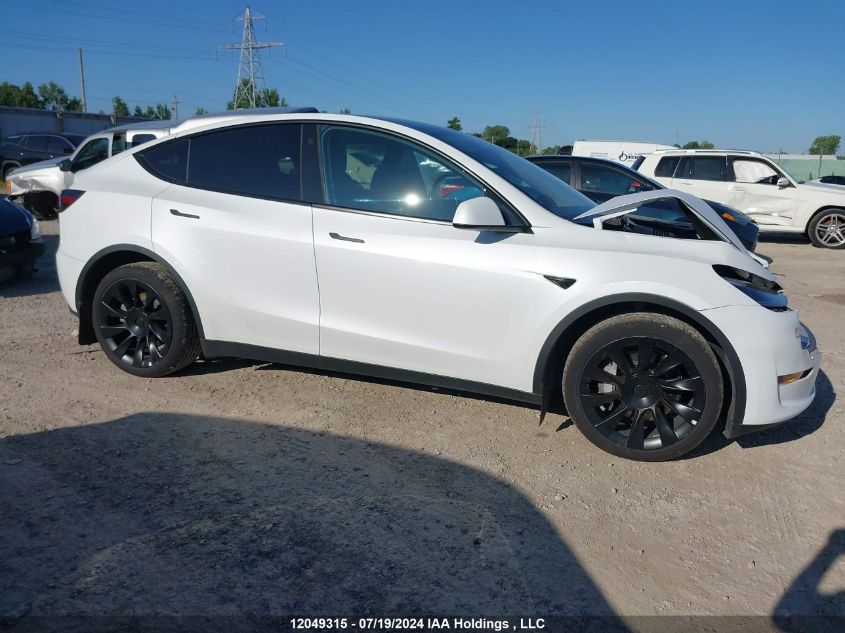 2023 Tesla Model Y VIN: LRWYGDEEXPC071996 Lot: 12049315