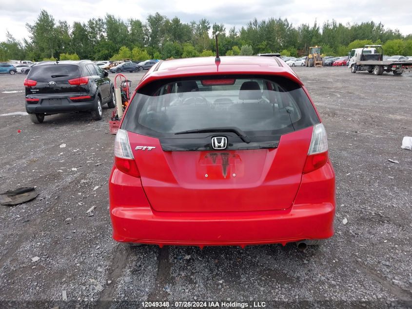 2009 Honda Fit Lx VIN: JHMGE88529S808672 Lot: 12049348